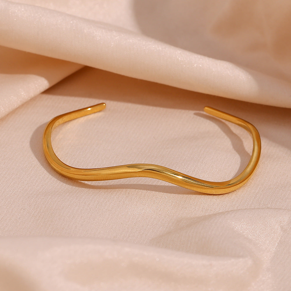 Luminous Elegance Golden Arc Bracelet