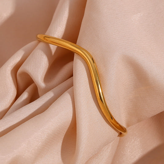 Luminous Elegance Golden Arc Bracelet