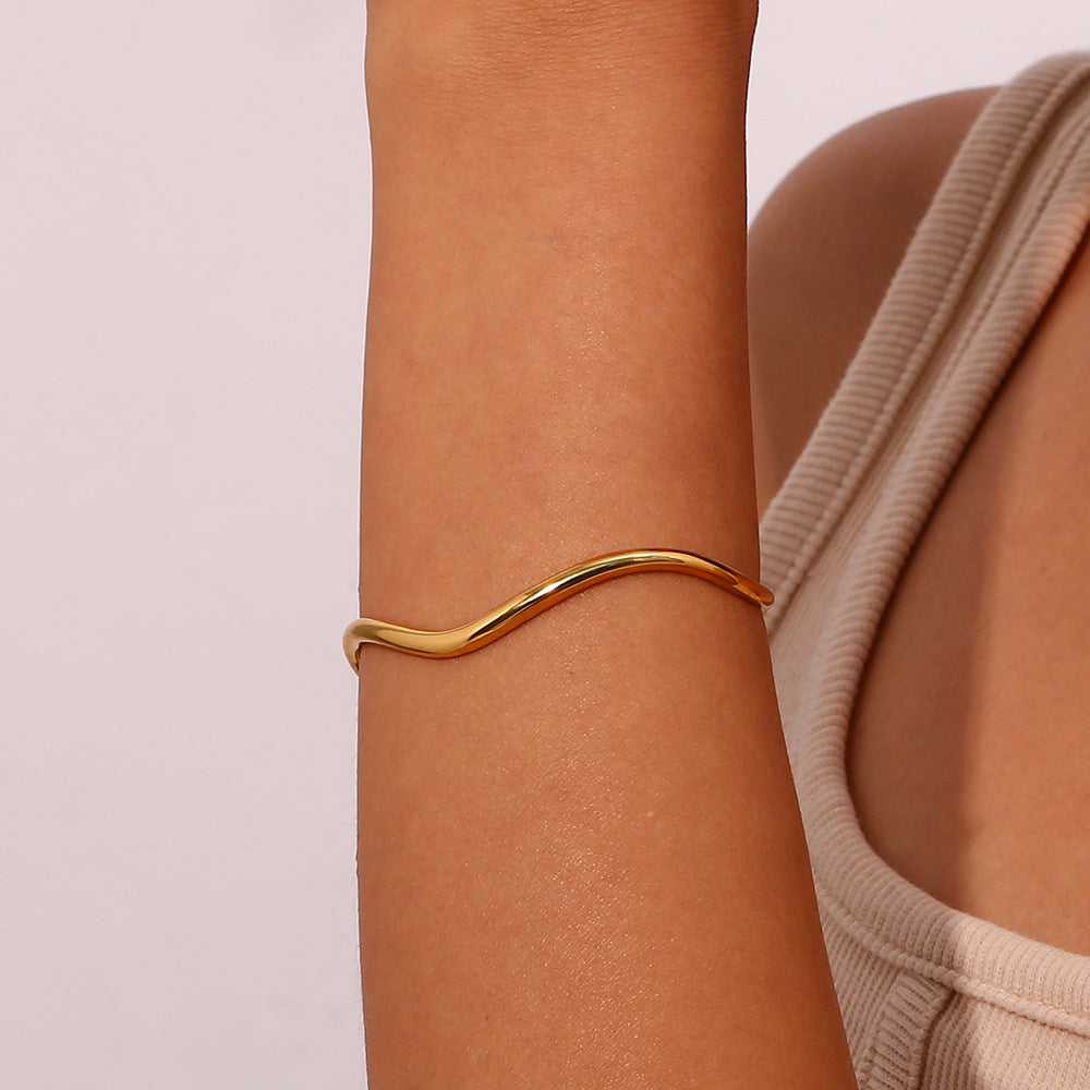 Luminous Elegance Golden Arc Bracelet