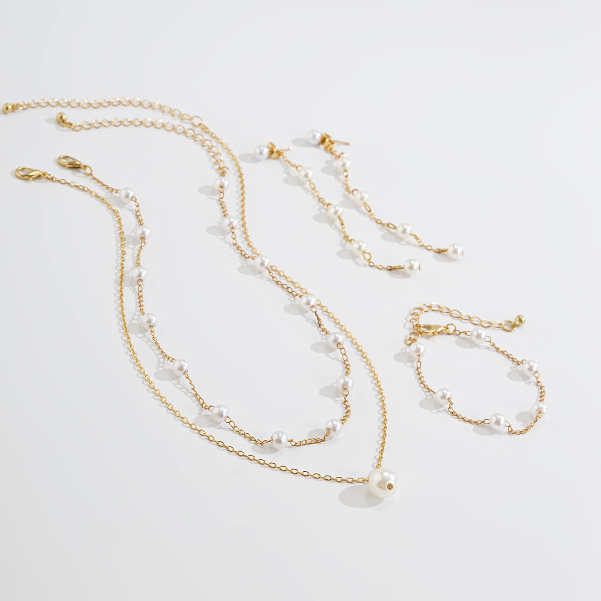 Golden Radiance & Pearl Elegance Triplet Jewelry Collection