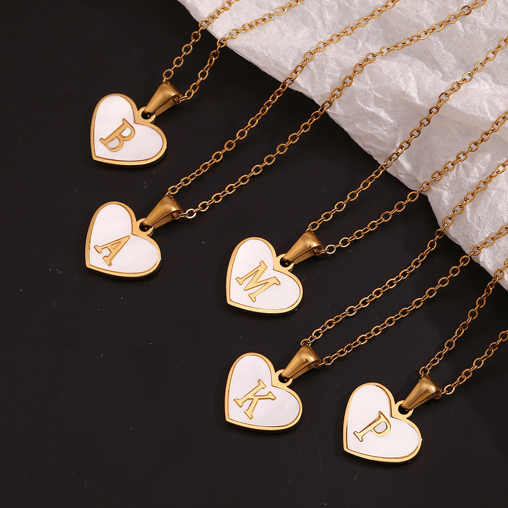 Shell Whispers letter love, stainless steel plated 18 karat gold heart shell 26 letter necklace