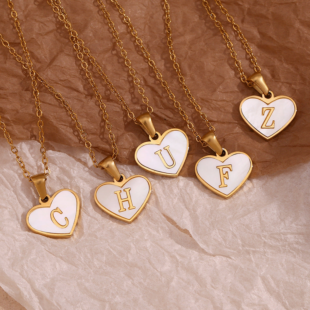 Shell Whispers letter love, stainless steel plated 18 karat gold heart shell 26 letter necklace