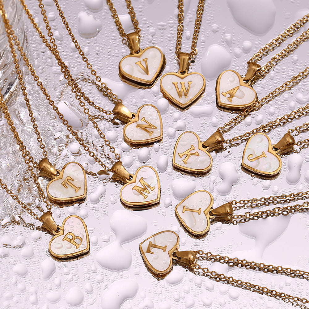 Shell Whispers letter love, stainless steel plated 18 karat gold heart shell 26 letter necklace