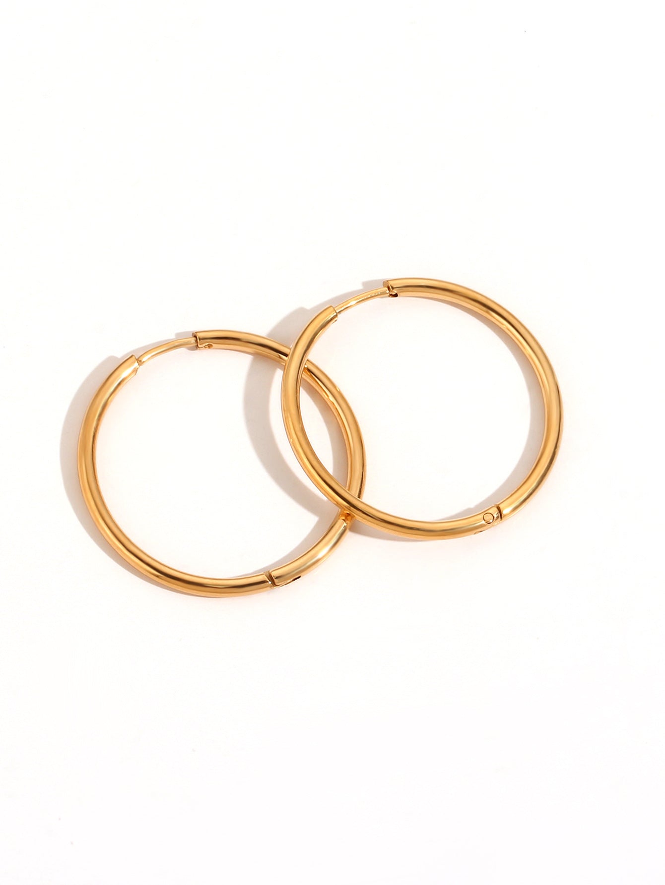 Intertwined Golden Ring Earrings